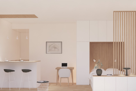Bright and airy Scandinavian-style studio apartment interior featuring a clean design with neutral tones, minimalist furniture, a bar counter with stools, wooden accents, and natural light.