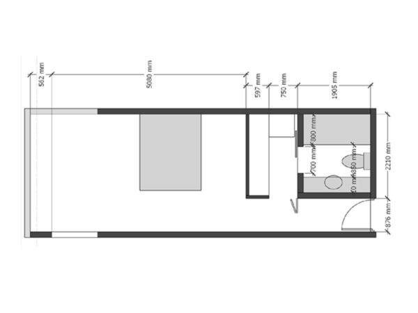 Architectural floor plan of a compact living space with detailed measurements and layout design. This floor plan represents a well-thought-out design for a contemporary living space, detailed with precise measurements to optimize the area. The plan includes a living area, a kitchenette, and a bathroom, each carefully placed to maximize the flow and functionality within a compact square footage. Clear demarcations for furniture and fixtures illustrate a mindful approach to living comfortably in a smaller footprint, ensuring every inch serves a purpose. This plan is a testament to modern architectural ingenuity, where space constraints are met with creative solutions to cultivate a practical yet cozy habitat.