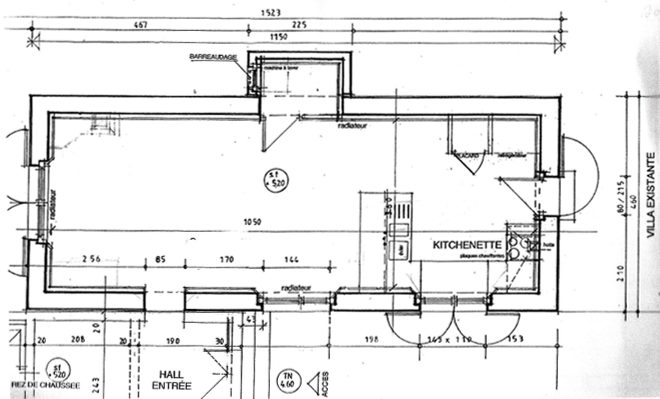 An architectural blueprint of a residential space showcasing detailed measurements and room layout. This image features the meticulous details of an architectural blueprint for a residential unit. Each line represents the walls and boundaries of the space, with clear annotations providing dimensions for each room, ensuring precision in execution. The plan includes essential features like a kitchenette, indicating thoughtful consideration of functionality and space utilization. This blueprint is not just a technical document; it symbolizes the careful planning that lays the groundwork for building a home, highlighting the importance of every inch in crafting a comfortable and efficient living environment.