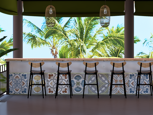 A bar counter with colorful mosaic tiling and high wooden stools in a tropical setting with palm trees visible in the background and natural light filtering through large open windows. This inviting image features a stylish bar counter set against a backdrop of swaying palm trees, visible through expansive open windows that let in an abundance of natural light. The counter is adorned with a vivid mosaic of tiles, each piece telling a story of artistry and cultural richness. High stools with dark frames and wooden seats line the counter, offering a welcoming spot for guests to sit and enjoy their tropical surroundings. Overhead, cylindrical wicker pendant lights hang, adding a rustic charm to the space. The overall ambiance is casual yet sophisticated, perfectly blending traditional design elements with the laid-back luxury of island life.