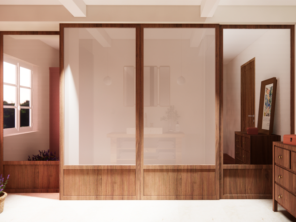 A rustic yet refined bathroom featuring sliding glass doors with wooden frames, leading to a well-lit vanity area, complemented by a traditional wooden dresser and a window revealing outdoor greenery.