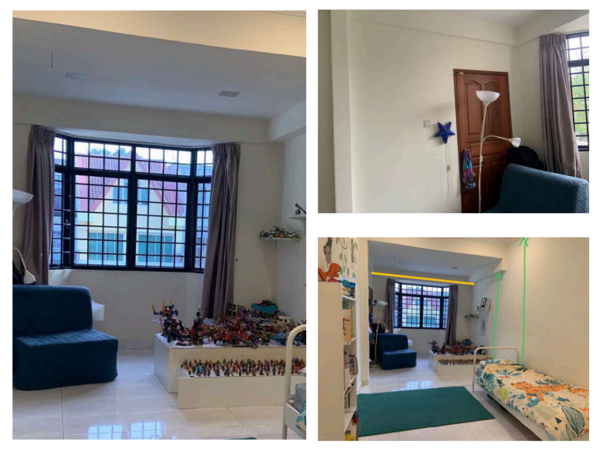 A child's room with a cluttered floor, toys scattered around, and a simple bed and sofa.