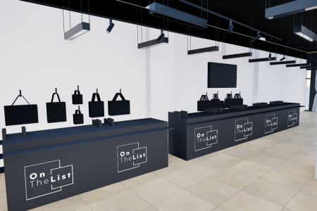 A minimalist retail store interior with a black counter, shelves, and bags displayed on the wall.