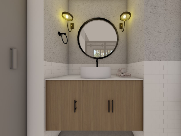 A minimalist powder room with a round mirror, wooden vanity, and white subway tile walls.