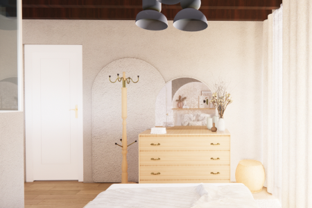 A cozy bedroom with a wooden dresser, a round mirror, and a plush bed.