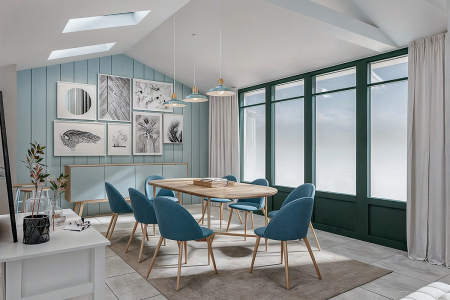 A bright and airy dining room with a blue accent wall, large windows, and a wooden dining table with blue chairs.